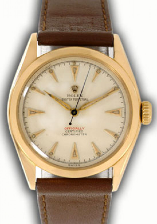Rolex 6084 Yellow Gold on Strap, Smooth Bezel White with Gold Index